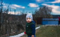 a boy in a hat